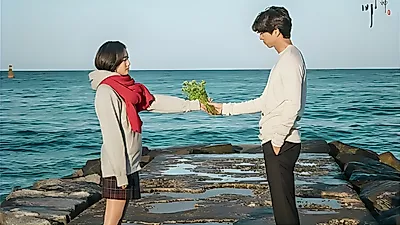 Gong Yoo and Kim Go-eun return to Jumunjin, red scarf and all