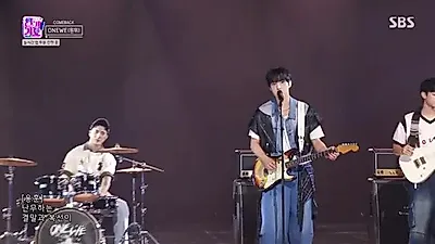 ONEWE lets 'Scenario' surge live in a full-band Inkigayo stage
