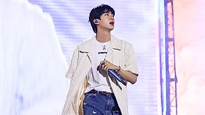 BTSジン初ソロツアー、海外アリーナから劇場公開へ広がる展開
