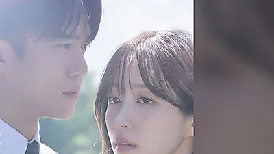 Ha Seok-jin and Hani almost touch noses in Love Is Coming poster