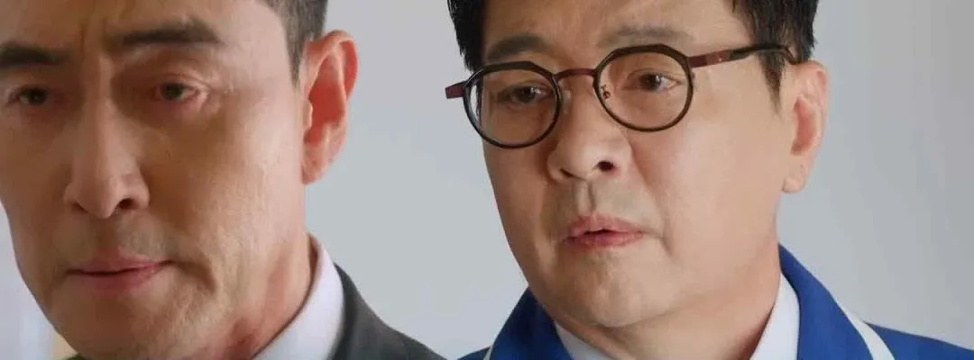 Two Characters Confront Each Other Over Memory Card Issue in Drama Scene