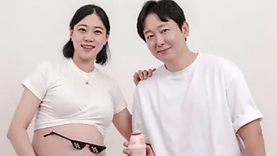 Lee Dong-jin beams as twins arrive after a nine-year wait