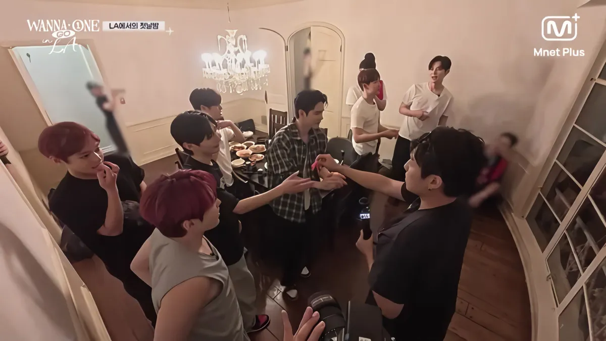 Wanna One Members Play a Game to Decide Cleaning Duties at Their LA Accommodation