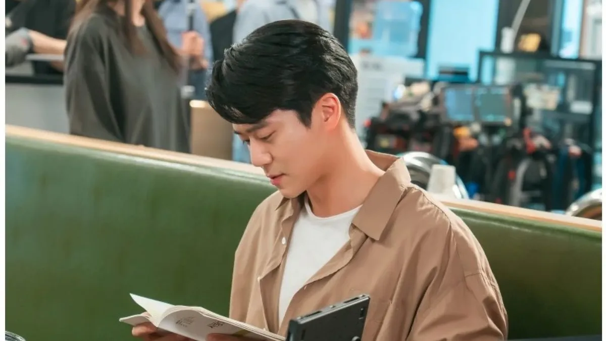 Actors Reviewing Scripts on the Set of Drama 'Love is Coming'