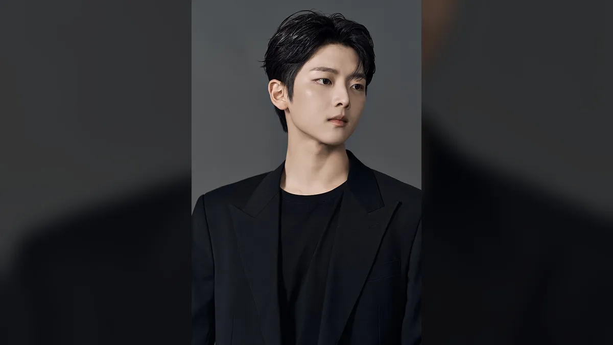 Park Do-ha slips into a black suit for his most grown-up profile yet